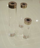 A Set of Three Modernist Candle Sticks in Lucite