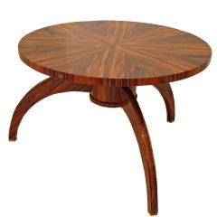 A  Round Art Deco Cocktail Table in Figured Walnut