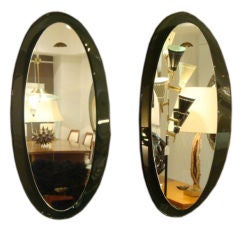 A Rare Pair of Oval Wall Mirrors by Fontana Arte