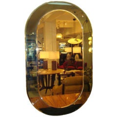 A Large Oval Wall Mirror by Fontana Arte