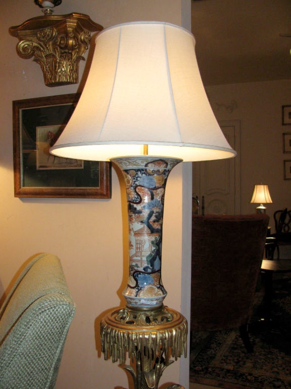 Pair of Japanese Imari Trumpet Mouth Vases made into Lamps, set on brass bases
