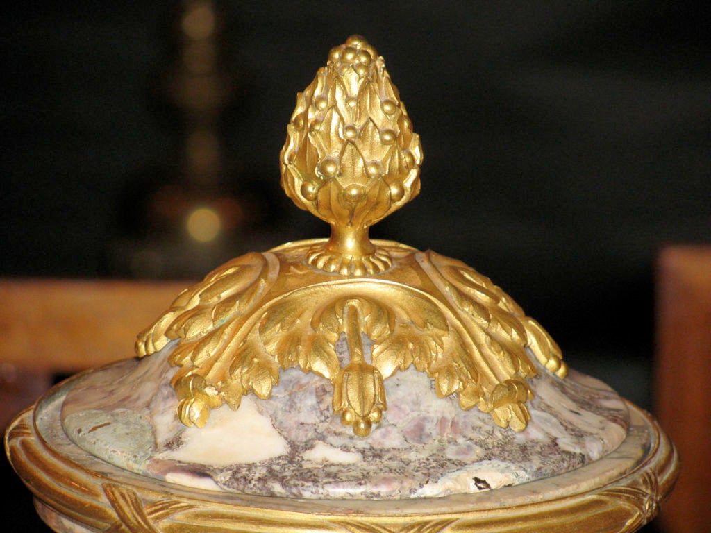 Louis XVI style carved urn in Breche Violette marble with ormolu mounts