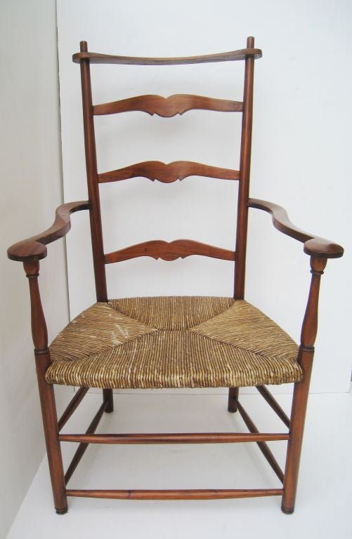 Ladder Back Arm Chair with Rush Seat.