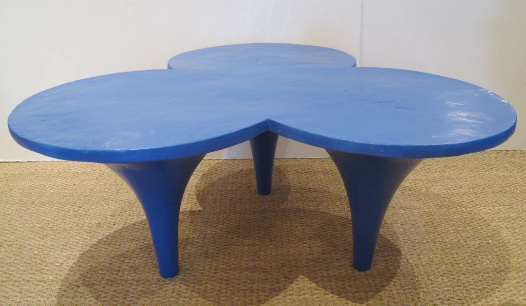 Trefoil Resin Coffee Table.<br />
Can be used Outdoors. Takes the shape of 3 tree trunks.