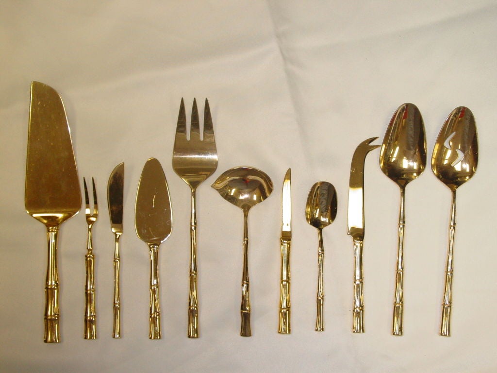 From Towle's Supreme Cutlery line, 12 6 piece places settings of Gold Cane pattern flatware.  Also included are six fruit knives, 6 steak knives and ten assorted serving pieces. Very fine quality.