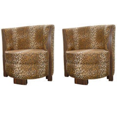 Pair of Art Deco Style Macassar Ebony Barrel Chairs.