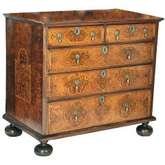 William and Mary burled elm, fruitwood and walnut chest.