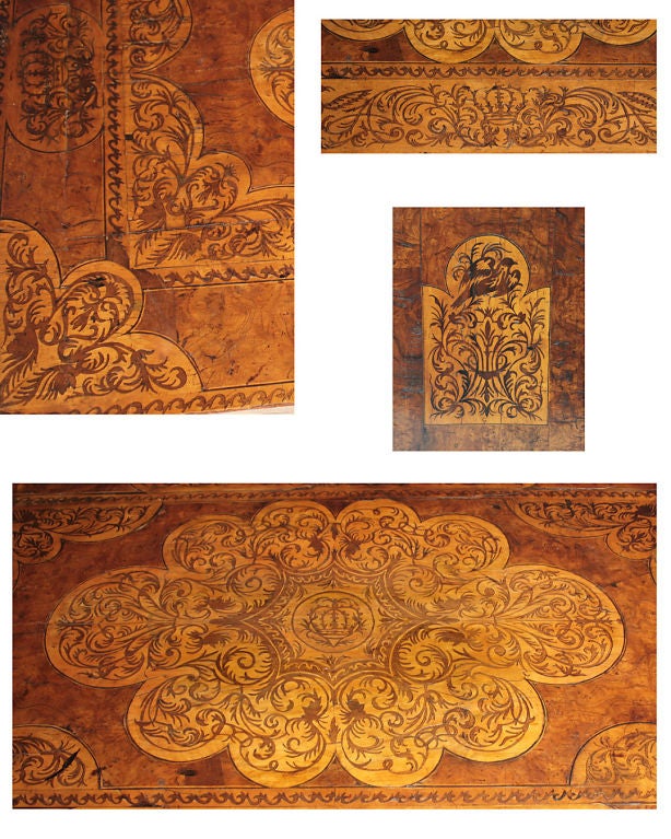 An unusually fine William and Mary burled elm, fruitwood and walnut seaweed marquetry chest, attributed to Gerrit Jensen.<br />
<br />
Gerrit Jensen (fl. 1667-1715) was one of the finest cabinet makers in the early 18th century and was