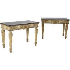 A pair of Continental console tables.