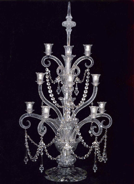 A fine and unusual F & C Osler large 3-tier 9-light table candelabra, the faceted and scrolled arms hung with swags of crystal beads and <br />
pendants