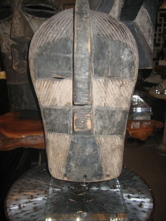 Various Collection of Songye Masks on Stands