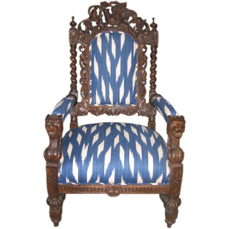 19th c. English Baronial Carved Hall Armchair in Ikat Fabric