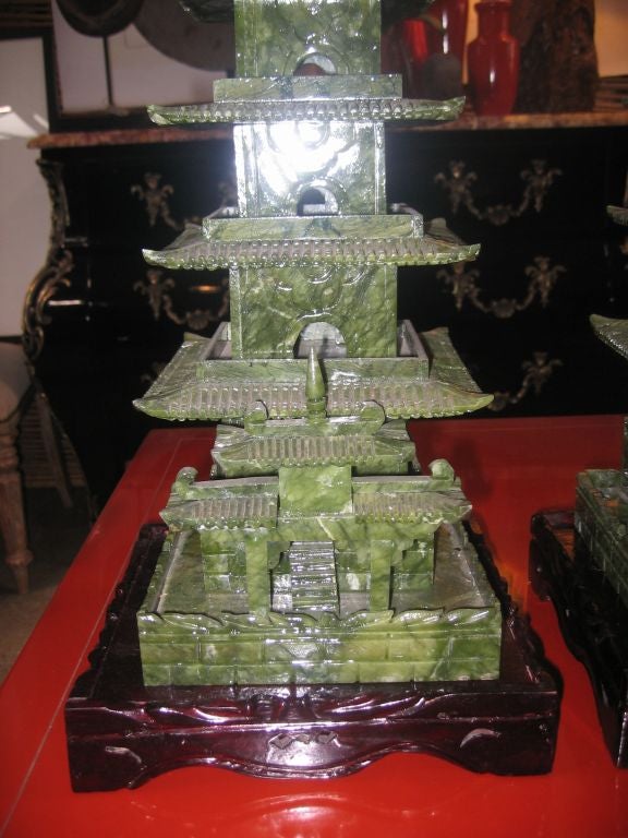 Pair of intricately carved jade pagodas.
