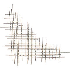 Metal Wall Sculpture in the Style of Curtis Jere