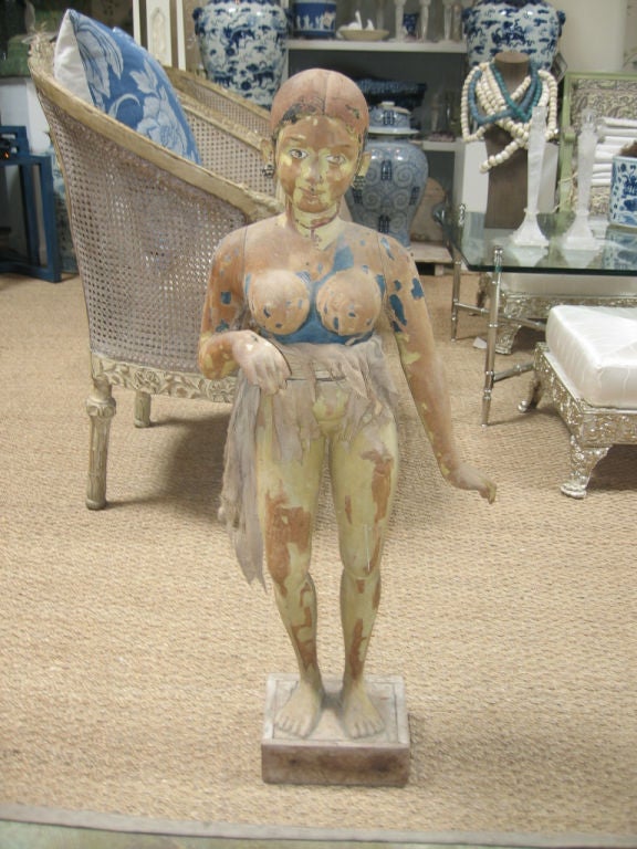 Beautifully authentic hand carved statue of an Indian deity goddess. Distressed paint finish.