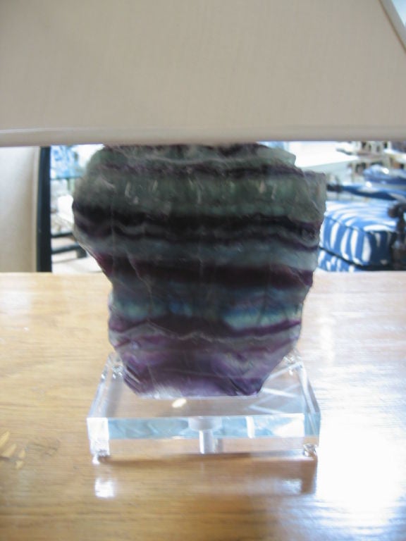 Beautiful pair of fluorite and amethyst geodes mounted on acrylic bases. Acrylic measures 1.5