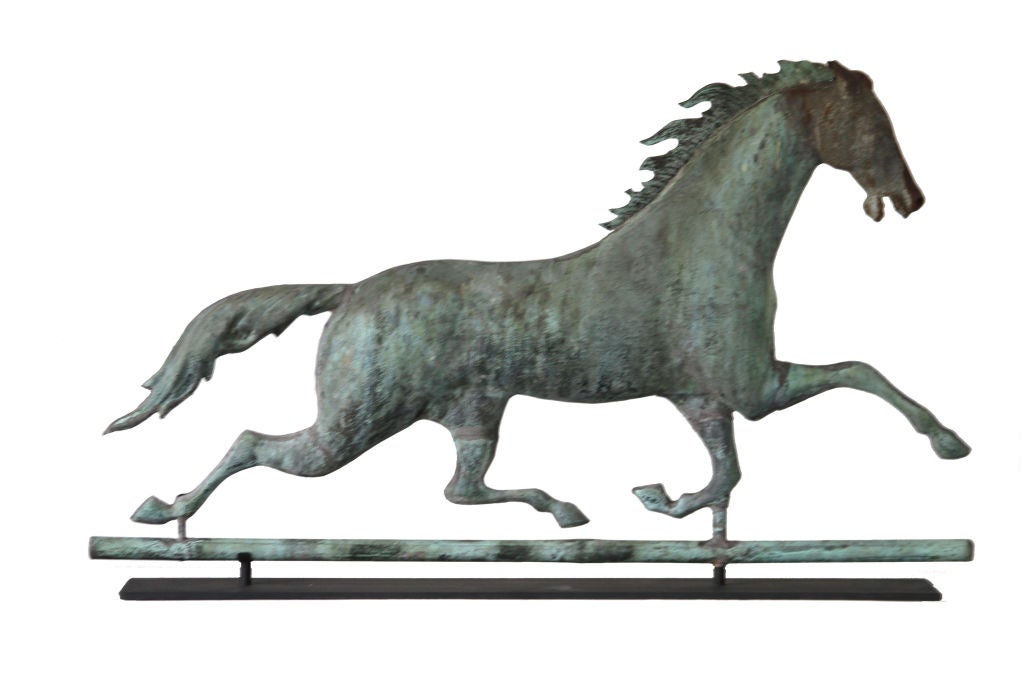Running horse weathervane with overall pleasing untouched verdigris surface.  Superb example with a great deal of spirit and movement.  Probably Fiske and Company, New York, New York.