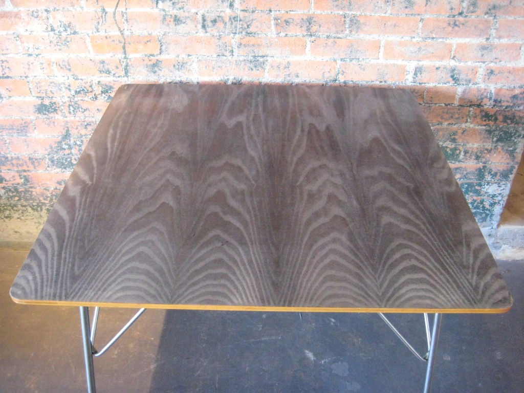 Rare and early black aniline-dyed folding table by Charles Eames