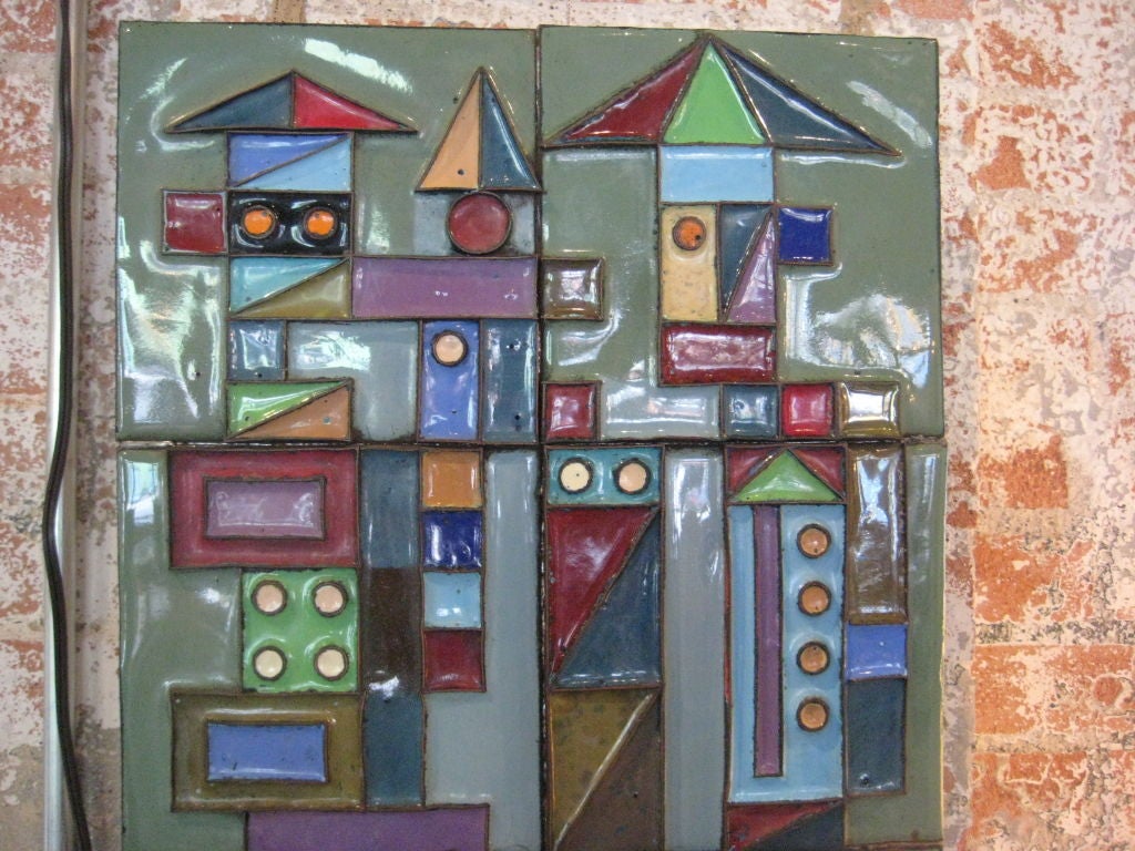 Amazing enameled steel wall sculpture with vibrant coloring. This sculpture was done by Edgar Tafur, an artist from Ohio who did many monumental public sculptures and has work in many museums.