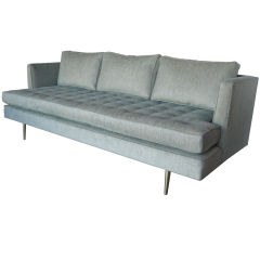 Dunbar sofa on polished brass legs