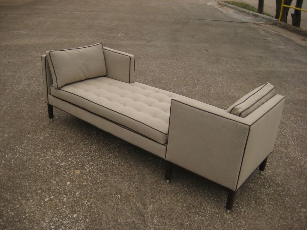 A classic Wormley design beautifully restored with down cushions and leather piping.