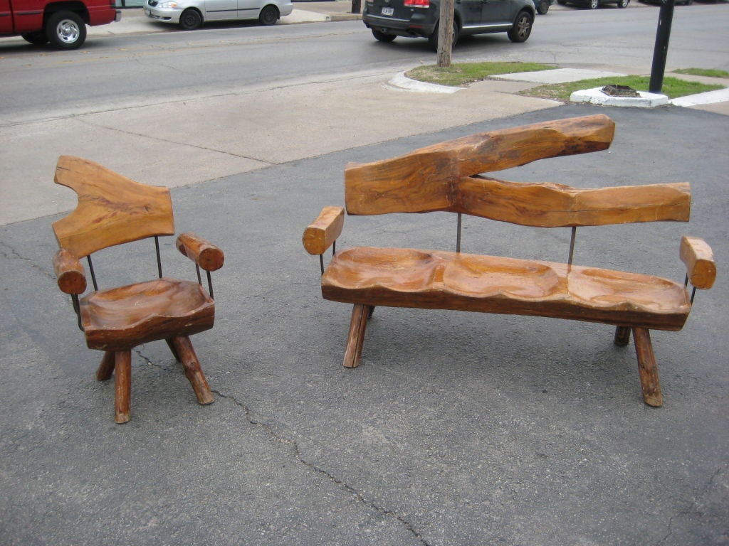 Sculpturally crafted sofa and chair from Mexico.
