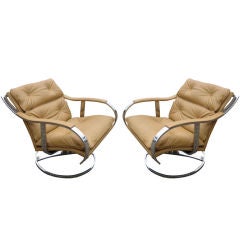 Vintage Pair of large swivel lounge chairs by Steelcase