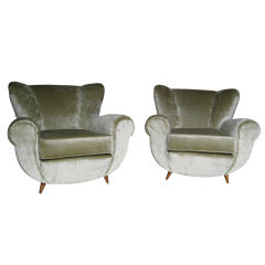 Pair of large scale Italian lounge chairs