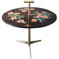 Brass table with flower motif by Piero Fornasetti