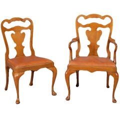 A Set of Twelve Walnut Georgian Style Dining Chairs
