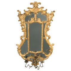 An 18th Century Italian Rococo Cartouche Form Giltwood Mirror
