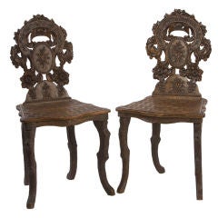 Pair of Swiss walnut hall chairs