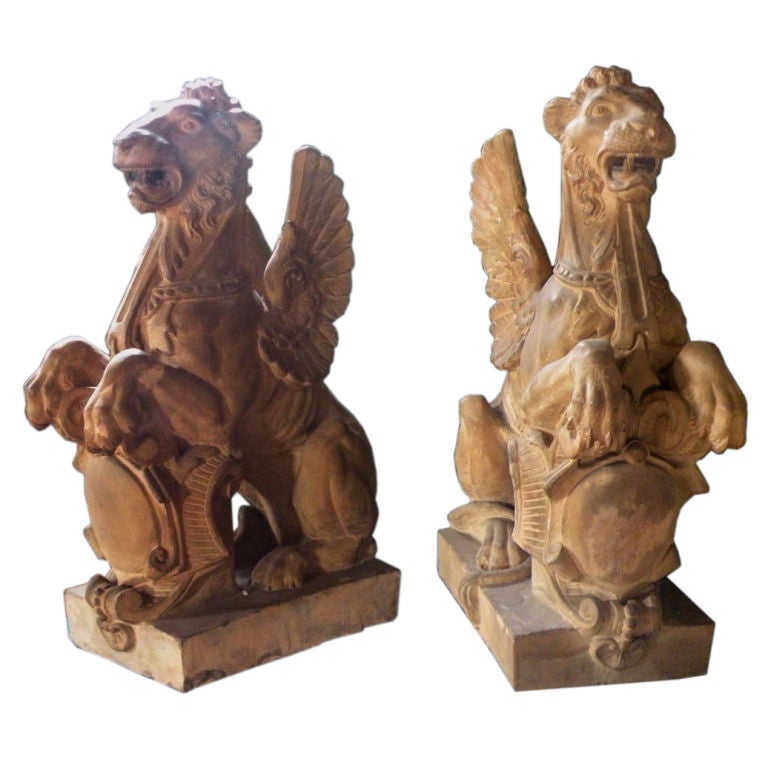 Pair of 19th Century Terra Cotta Winged Lions For Sale