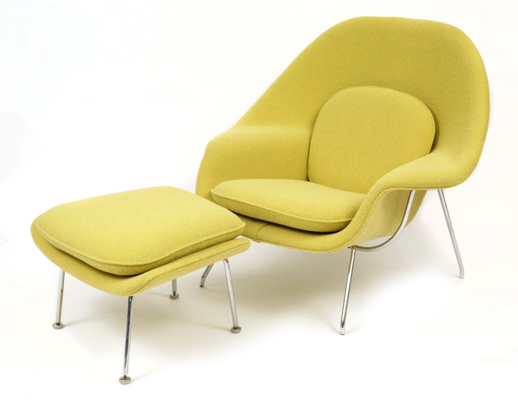 Iconic Eero Saarinen for Knoll womb chair circa mid 1970's. This example is done in Knoll chartreuse boucle and has been impeccably restored. Red also has another womb chair done in a Knoll cream boucle with a black iron frame. Please inquire for