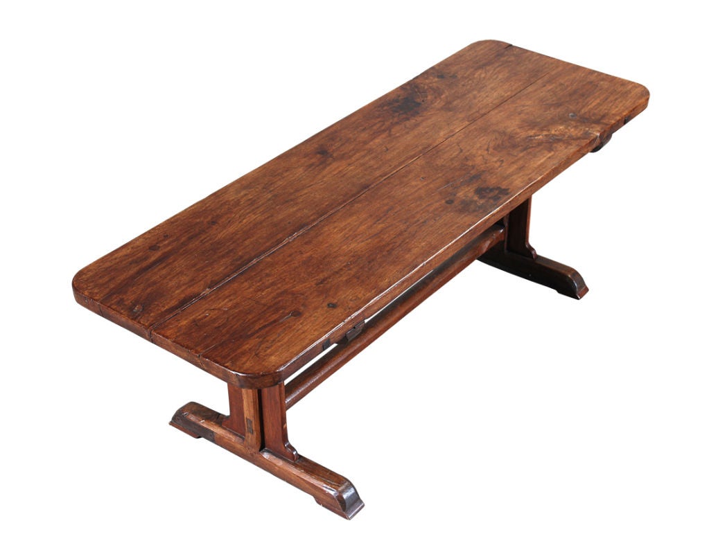A mid-18th Century oak farm table with a two-board, 2.25
