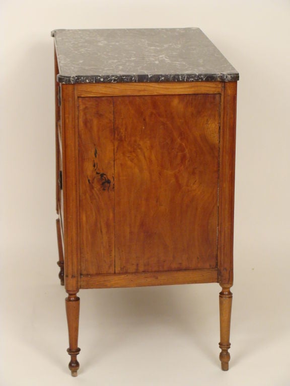 Louis XVl fruit wood marble top commode, circa 1800.