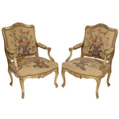 Pair of Louis XV painted and partial gilt armchairs