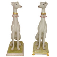 Pair of faience greyhounds