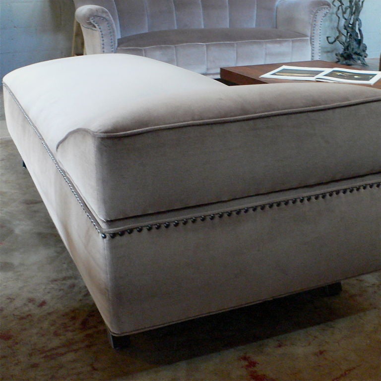 Mid-Century psychiatrist's couch upholstered in cotton velvet with nail head detail.