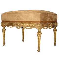 A Neoclassical gilded wood stool carved