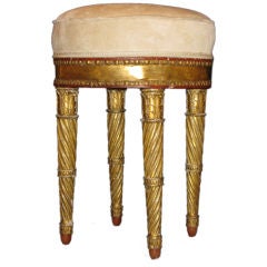 A carved and gilded Neoclassical stool