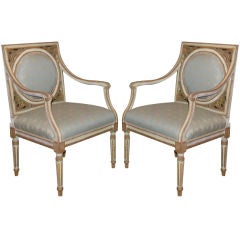 A Pair of Painted and Gilded Neoclassical Chairs