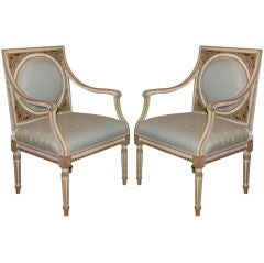 A Pair of Painted and Gilded Neoclassical Chairs