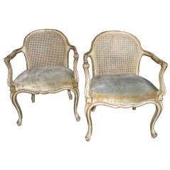 Pair of Louis XVI style Parcel Gilt Petite Armchairs