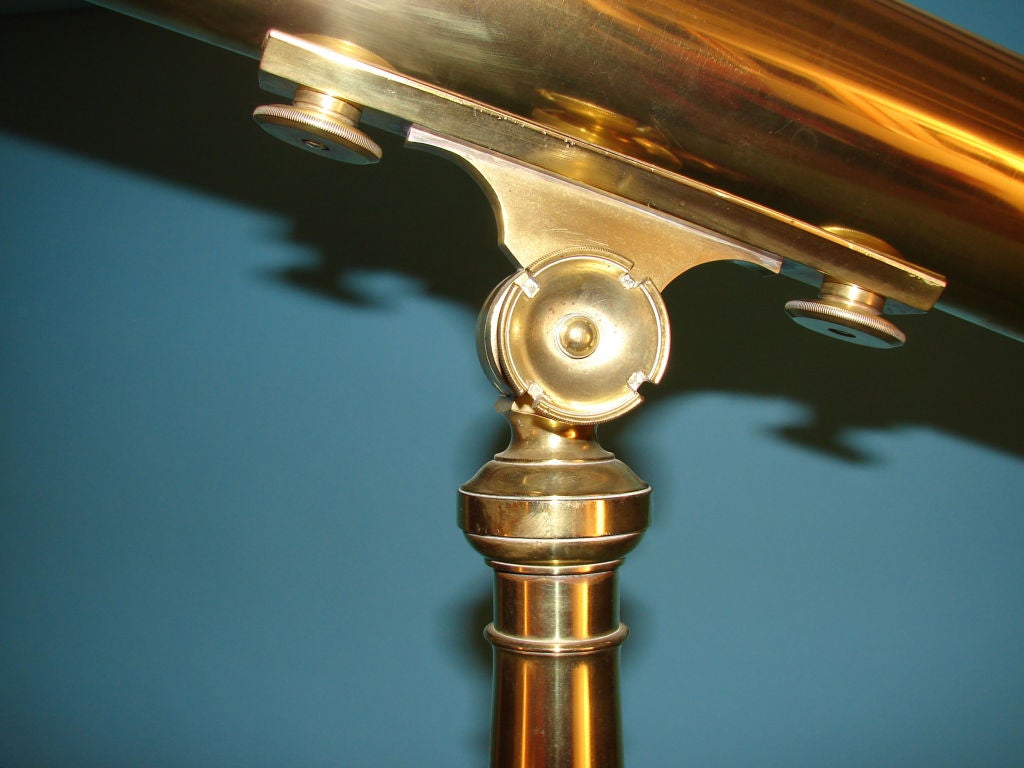 19th Century English brass telescope on tripod.