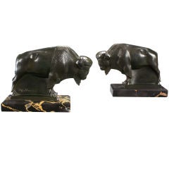 A Pair of Art Deco Patinated Bronze Sculptures of American Bison