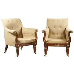 A Large Pair of Regency Upholstered Armchairs