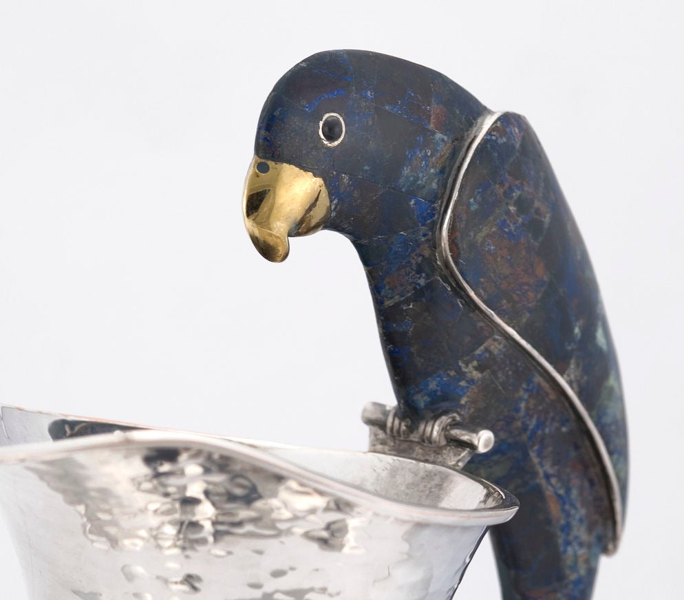 PLEASE VISIT LAUREN STANLEY IN NEW YORK<br />
<br />
A fine silver plate water pitcher by Los Castillo, of Mexico, the base bulbous with ten (10) lobes, and with a handle of lapis lazuli-like stone in the shape of a parrot.    Dimensions:  13