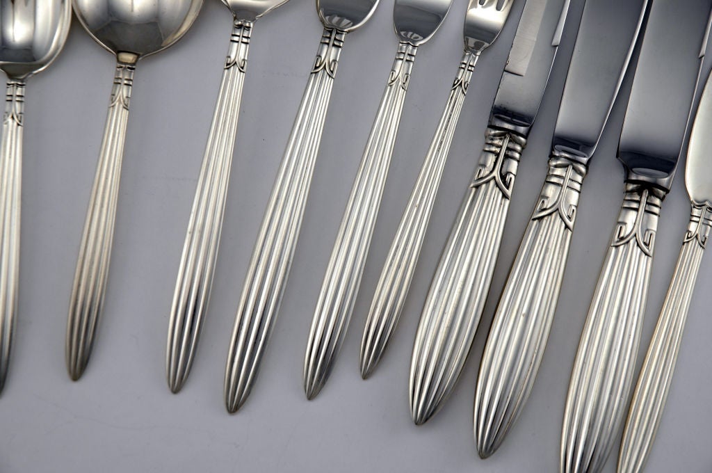 A superb large 154 piece flatware set by REED & BARTON, of Taunton, MA, in the Jubilee pattern designed by the architect Carl Conrad Braun (1905-1998).   As stated in Jewel Stern's Modernism in American Silver - 20th Century Design', see pages