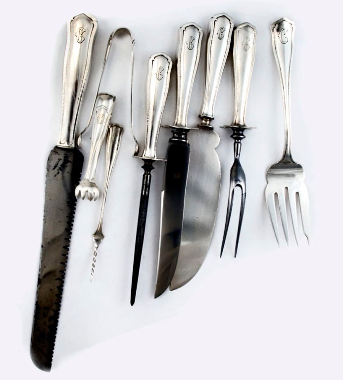 A fine and large circa 1915 sterling silver flatware set by Shreve, of San Francisco, designed by Joseph E. Birmingham and introduced in 1909, in the desireable and rare Dolores pattern, a modified arts and crafts motif more restrained than Shreve
